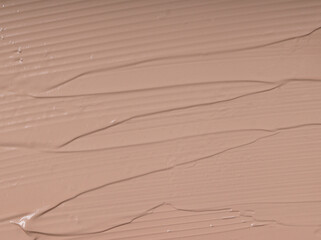 bb cream foundation texture . Close up beauty make up. Warm tone foundation