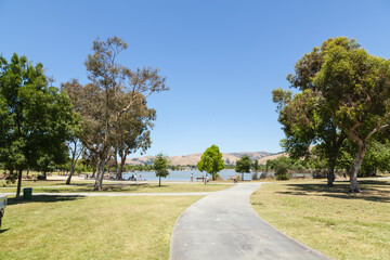 Lake view with beautiful reflections. Hills and forest. Lake Elizabeth in Fremont, California, USA.
