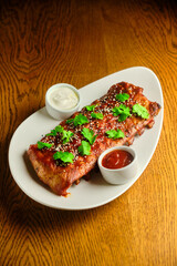 Grilled and smoked ribs with barbeque