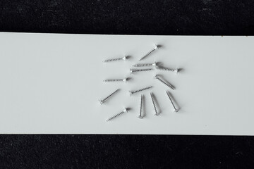 Screws for construction on a white background