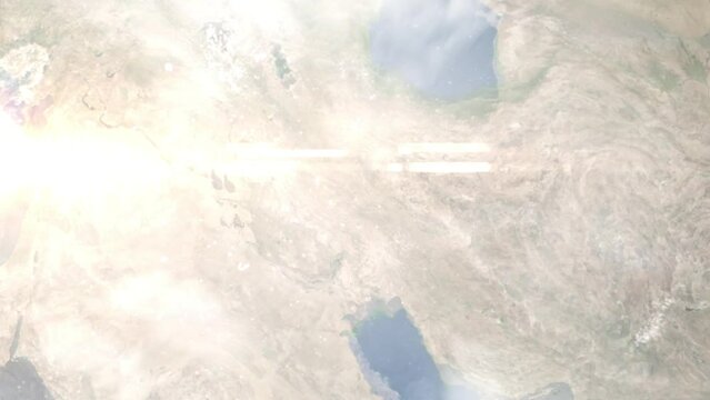 Earth zoom in from outer space to city. Zooming on Khorramabad, Lorestan, Iran. The animation continues by zoom out through clouds and atmosphere into space. Images from NASA