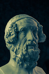 Bronze color gypsum copy of ancient statue Homer head for artists. Plaster antique sculpture of...