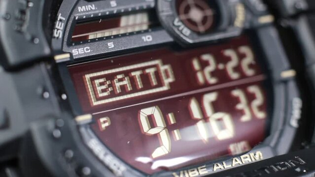Macro close up of a tactical digital watch face functioning

