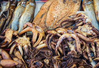 fish market, smoked squid and octopus street trade