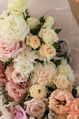 Many flowers in a bouquet with eustoma, rose, carnation
