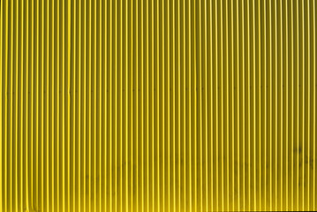 Obraz premium bright yellow corrugated metal wall textured background