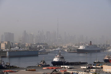 Fototapeta na wymiar View of Dubai Port with Burj Khalifa as background