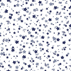 Obraz premium Floral seamless pattern with cute small blue flowers on white. Ditsy print for fabric, textile, baby clothes, bed linen.