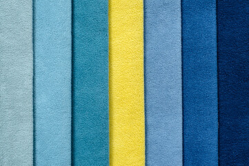 Fototapeta premium background is blue and its shades. set of multi-colored dense fabrics of uniform texture. Vertical stripes.