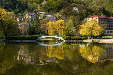Small bridge cross over the small lake in Dilijan city park
