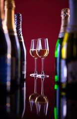 Two glasses of sparkling wine for coffee bottles.beautiful photo of alcohol