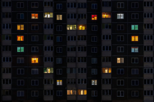 flat night panorama of multicolor heart light in windows of multistory buildings as concept for a couple in love
