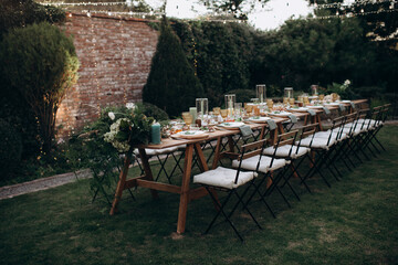 served banquet table with fresh dishes with food