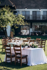 served banquet table with fresh dishes with food