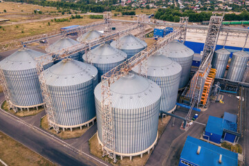 Grain storage in large silos aerial view. Silo with grain. Grain storage tank view from above