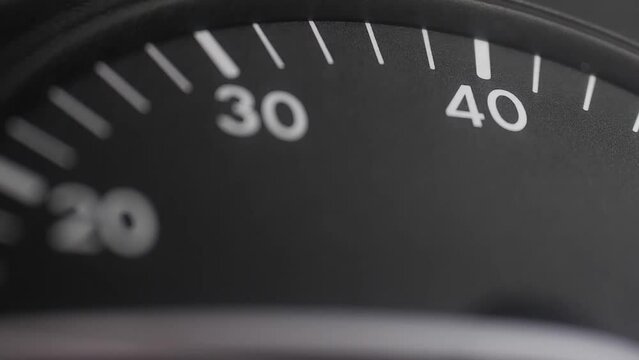 Tachometer needle. Car dashboard close-up. Deviation of the tachometer needle when pressing the accelerator.
