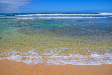 Gorgeous Tunnels Beach along the Kuhio Highway on the north shore of Kauai island in Hawaii - Relaxing holiday destination next to the Na Pali coast mountain range