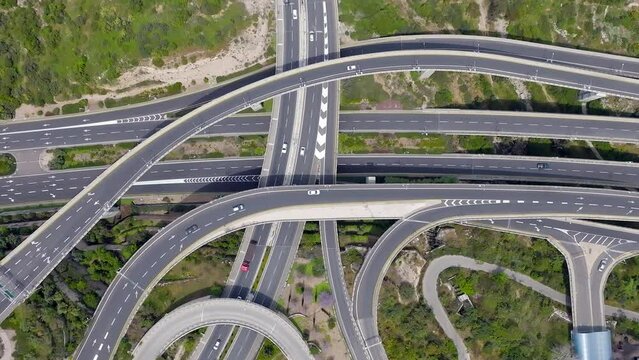 Massive multi level highway interchange with traffic on all routes, Aerial view.
