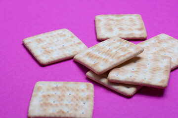cracker cookies on a pink background