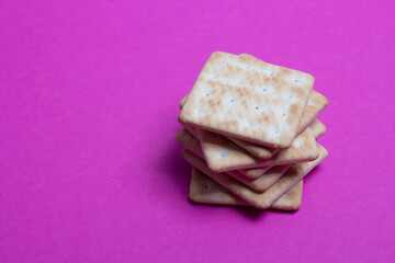 cracker cookies on a pink background