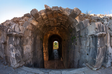 Miletus theater. The ancient roman amphitheater at Miletus, Turkey. The interior of the amphitheater. High arches of an antique building.