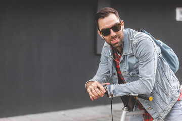 Smiling man with sunglasses looking at distance