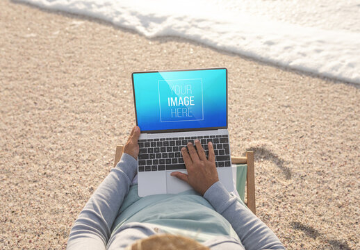 Man with Laptop on Beach Mockup