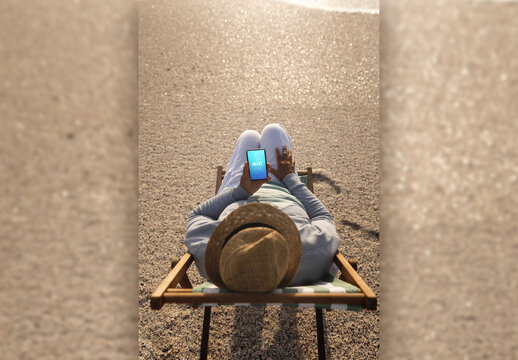 Man with Laptop on Beach Mockup