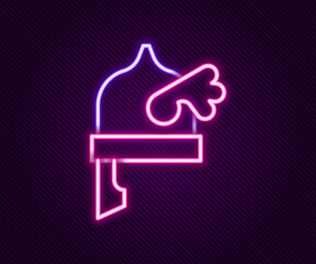 Glowing neon line Viking in horned helmet icon isolated on black background. Colorful outline concept. Vector