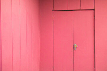 Pink interior. Door to hall. Painted walls.