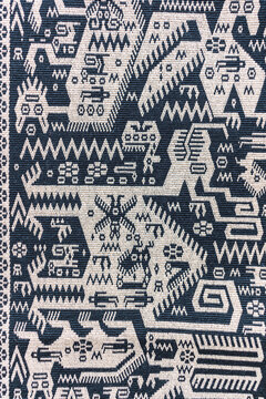 Decorative blankets fucking with alpaca fiber with ancestral designs and geometric figures of striking colors textured with ancestral patterns
