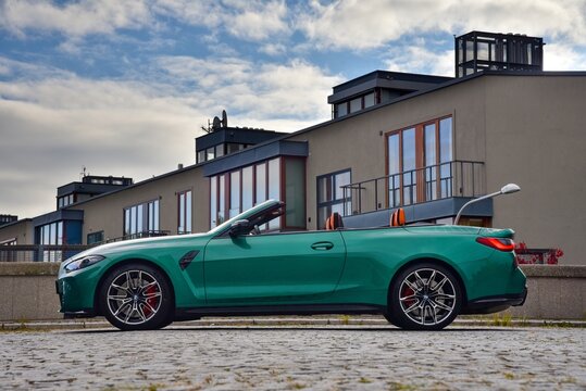 BMW M4 Competition Cabrio. Powerful six-cylinder convertible. General side view. 10-13-2021, Prague, Czech Republic.