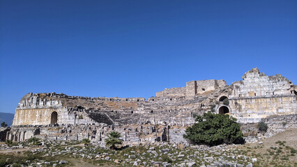 Milet, Miletus-Balat. Miletus theater. The ancient roman amphitheater at Miletus, Turkey. The ancient harbour city of Miletus was the economic and cultural centre of the eastern Aegean.