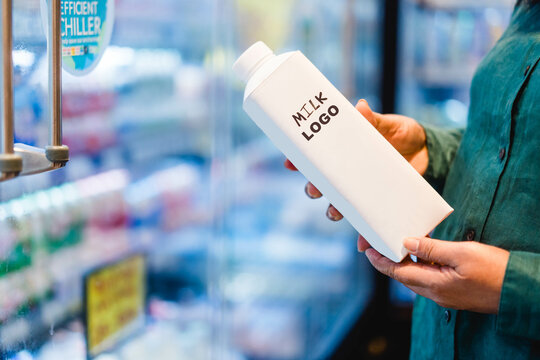 Milk Box With Empty Logo Bottle Mockup Package Cardboard Carton On Woman Pregnancy Hand For Shopping Milk.Calcium In Milk Product.Grocery Store.Check Expired.juice Package.Black American Customer.