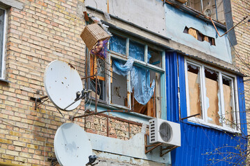War of Russia against Ukraine. Residential building damaged by enemy aircraft in Ukrainian. Consequences of war, damaged grocery market by troops of Russian army. private house destroyed.