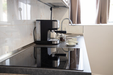 two cups of black coffee on the kitchen table