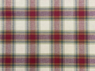 Colored checkered table cloth background. Texture of textile table napkin. Multicoloured gingham background.
