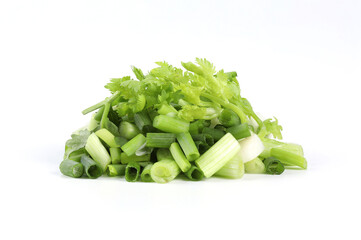 Fresh green coriander and spring onions cut into small pieces. Put together on a white background . It is a fragrant edible herb. Can be used for cooking and decorating food, can be eaten raw