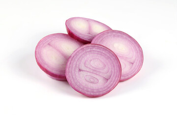 Red onion, sliced into rings, close-up on a white background It is a vegetable that can be eaten raw.