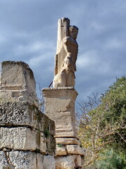 Ancient statue in an archaeological park in Athens, Greece