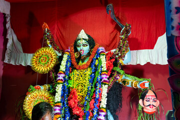 Kolkata,India - October 19, 2017 : Indian Hindu Goddess Kali is being worshipped inside decorated...