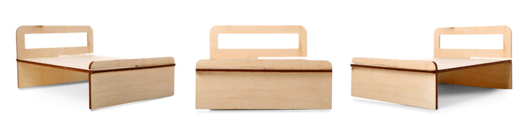 Set of toy wooden bed isolated on white