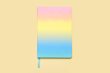 Bright notebook on color background