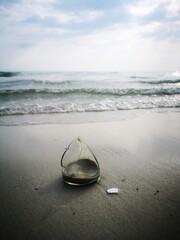 broken glass on beach may be danger to people
