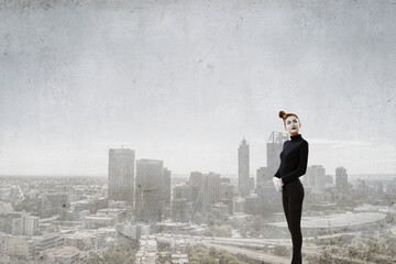 Female mime with white face