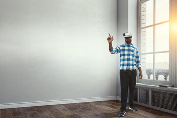 Fototapeta premium Man wearing virtual reality goggles