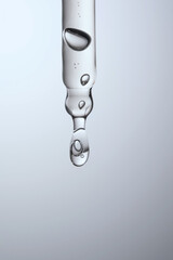 Pipette with serum, gel, oil or other cosmetic product.