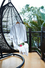 shower robe on resort hanging chair