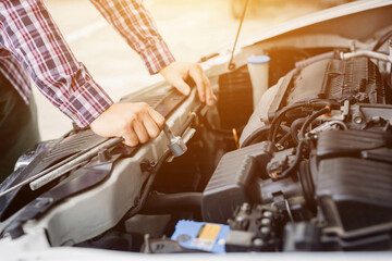 mechanic hand using wrench to repair the engine, car service