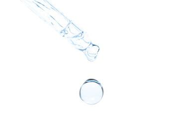 macro of pipette with liquid and drop on white background